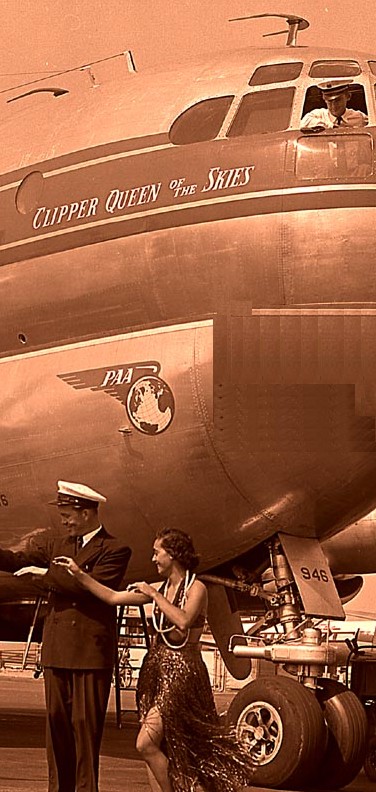 1951 Pan Am pilot & hula girl pose next to Boeing Stratocruiser Queen of the Skies  tail number N90946 at Los Angeles Airport.